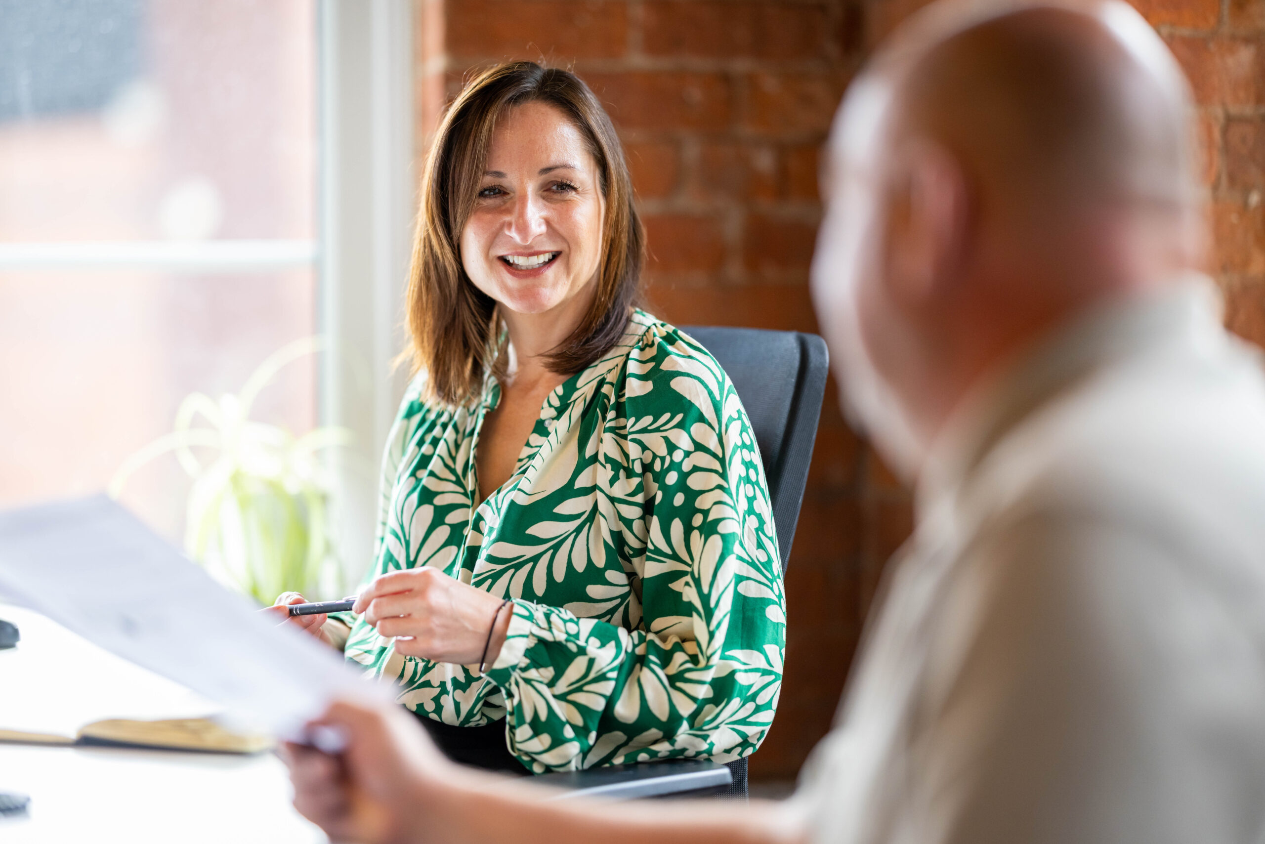 PIN communications staff in discussion