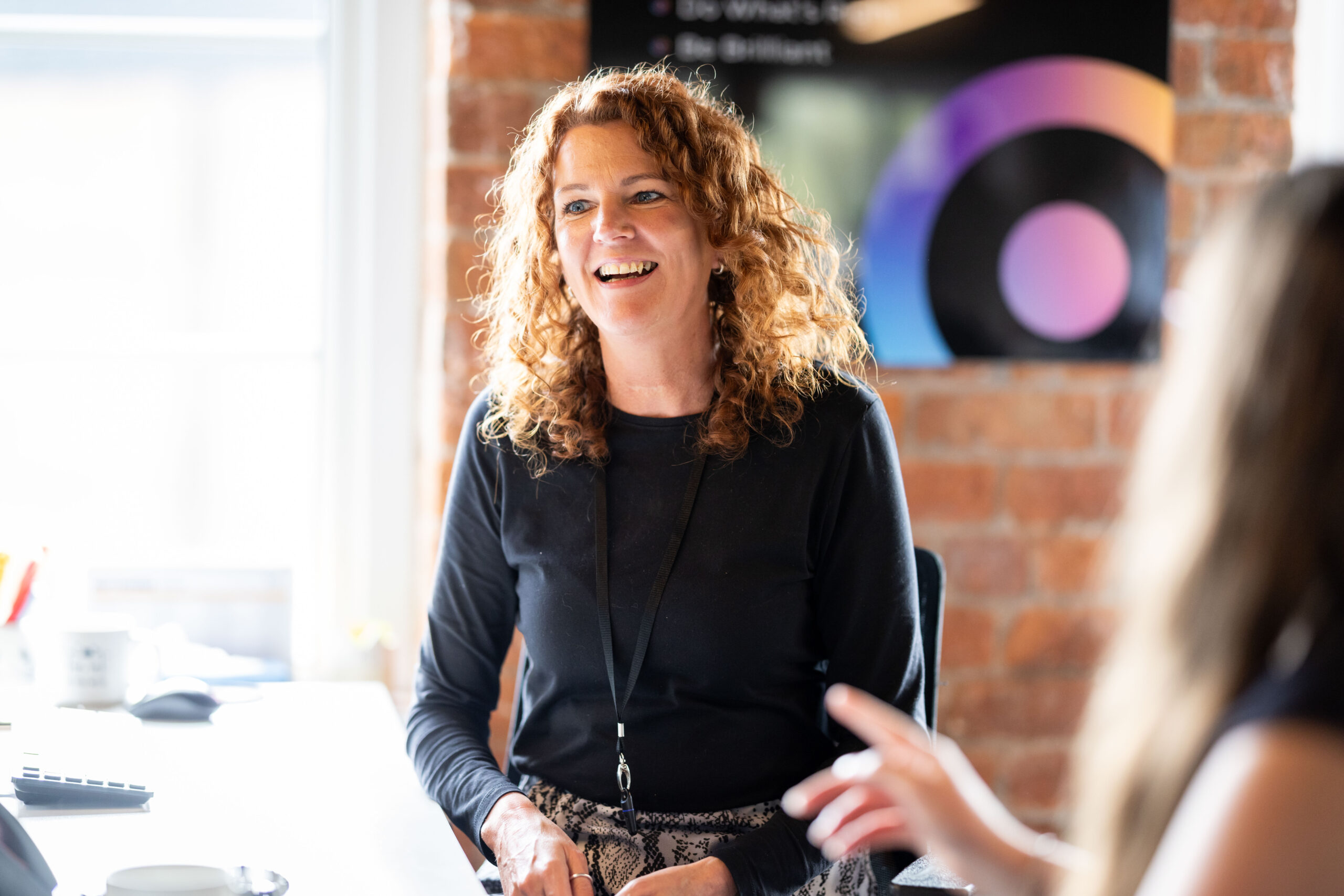 PIN communications staff member