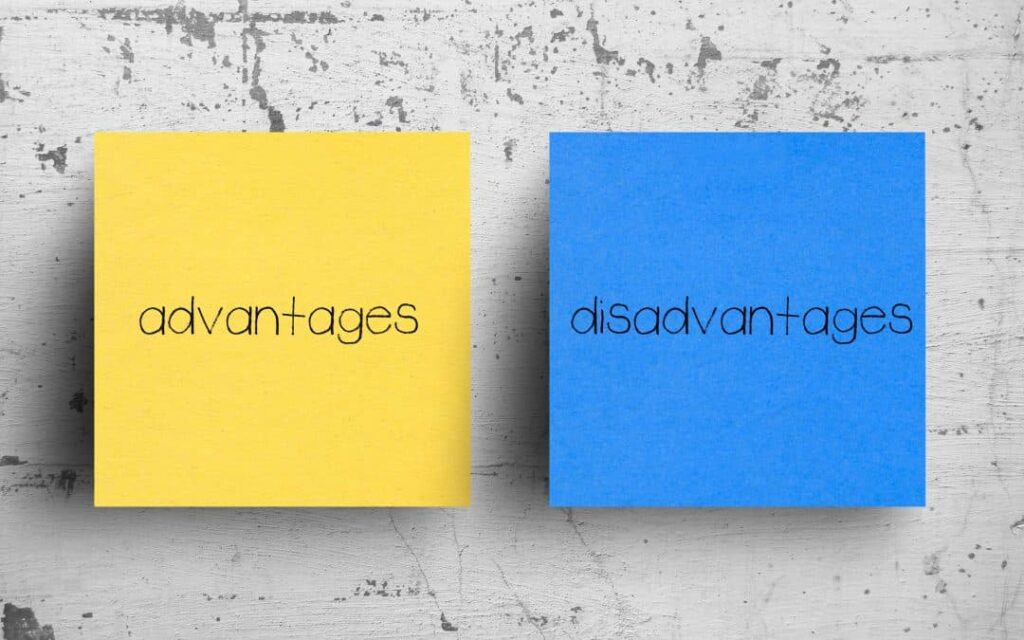 two post it notes with the text 'advantages' and 'disadvantaged' written on each